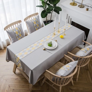 Waterproof faux linen grey table runner and cushion set with yellow diamond argyle patterns