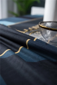 Macro view of luxury velvet tablecloth fabric with golden geometric lines and soft texture