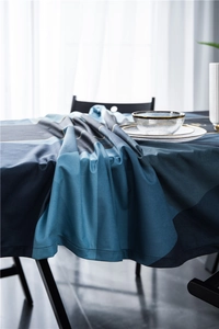 Detail of luxury velvet tablecloth with geometric navy blue and grey print texture