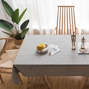 Nordic grey plaid tablecloth with floral embroidery on a rectangle dining table