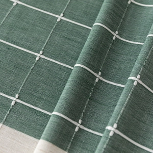 Dark green checkered cotton linen tablecloth with premium textured weave and tassel design