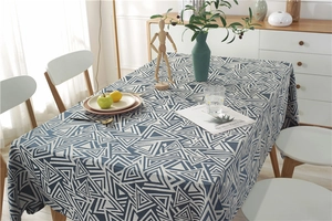 Detailed view of waterproof navy blue and white geometric triangle jacquard tablecloth