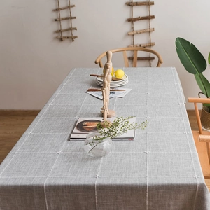 Modern Nordic grey jacquard checkered rectangle tablecloth with woven texture on table