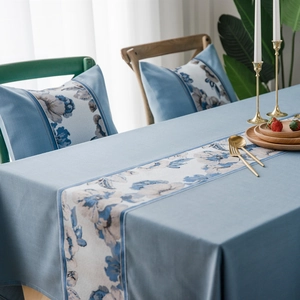 Waterproof faux linen blue tablecloth with floral prints and matching cushions
