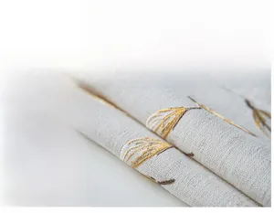 Detailed view of plant leaf embroidery and cotton linen texture on waterproof tablecloth