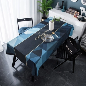 Modern velvet tablecloth featuring blue and gray geometric patterns with gold lines