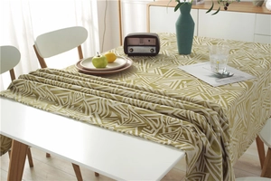 Detail of waterproof olive green geometric jacquard tablecloth in modern Nordic style