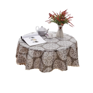Nordic round tablecloth with mandala print and elegant tassel edges in dark taupe