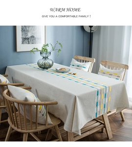 Detail of modern linen tablecloth with geometric embroidery and waterproof texture