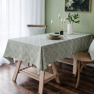 Waterproof sage green tablecloth with white wavy geometric pattern in Nordic style