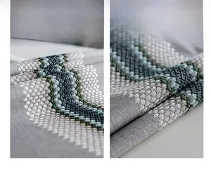 Detailed macro view showing fine stitching and smooth binding on cotton linen table runner