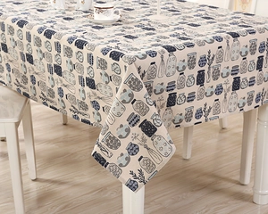 Detail showing creative blue floral and stripes pattern on rectangle linen tablecloth