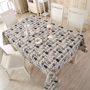 Detailed top view of pastoral cotton tablecloth with blue floral bottle pattern prints