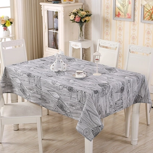 Detail of rectangular cotton tablecloth with black and white abstract wood grain pattern