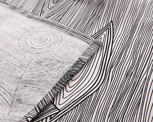 Macro detail of high-quality sewing edge on a striped cotton tablecloth with clean stitching
