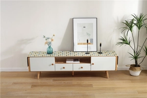 Modern TV stand detail with geometric runner and minimalist wooden furniture design