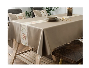 Detailed close-up of classical floral embroidery on luxury waterproof table runner