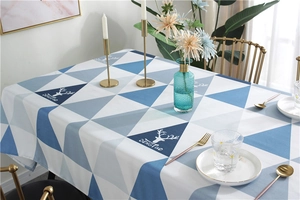 Nordic waterproof tablecloth with blue geometric triangle pattern and deer head logo