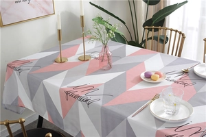 Detail of Nordic geometric triangle tablecloth with pink and grey waterproof fabric pattern