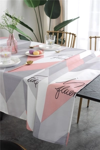 Detail of Nordic geometric triangle tablecloth with pink and grey waterproof printed fabric