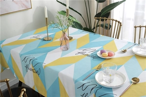 Detail of waterproof geometric triangle tablecloth with influential artistic lettering print