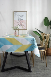 Detail of waterproof geometric triangle tablecloth with Nordic blue and yellow patterns