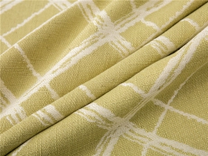 Detailed close-up of thick checkered woven fabric texture with light yellow and cream yarns