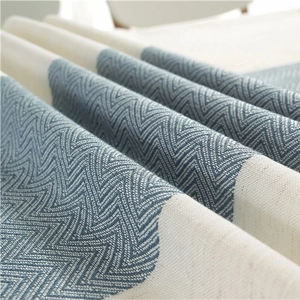 Waterproof linen-textured table runner with blue herringbone pattern and tassels