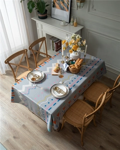 Detail view of thickened cotton-linen tablecloth with geometric abstract wave patterns