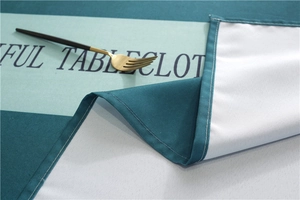 Detail view of polyester waterproof tablecloth with letter print and edge stitching
