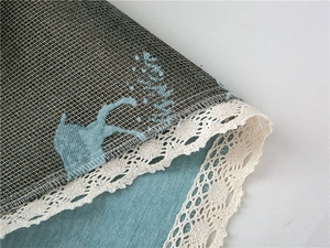 Close-up of thick chenille sofa cover showing texture, blue lining and white lace edge