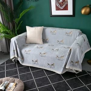 Blue chenille sofa cover with carriage pattern and white lace edge decoration