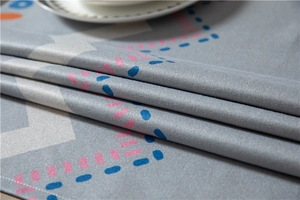 Macro shot of geometric printed cotton-linen tablecloth fabric with modern fiber texture