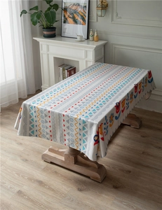 Detail of colorful geometric floral pattern on modern linen-style rectangular tablecloth