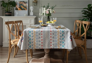 Detail of ethnic geometric patterns with hearts on thick polyester-cotton tablecloth