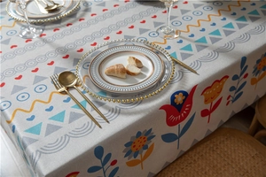 Detail of colorful geometric floral pattern on thick cotton linen rectangular tablecloth