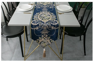 Classic European vintage table runner featuring intricate jacquard floral patterns and tassels