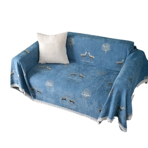 Thick blue chenille sofa cover with elk pattern, white lace trim and matching pillow