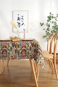 Detail of colorful Bohemian woven tablecloth with vibrant geometric jacquard textures
