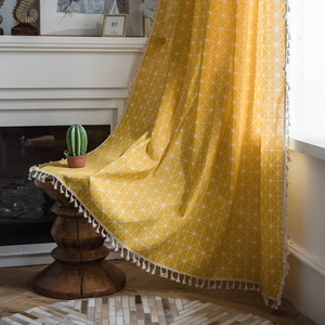 Modern mustard yellow checkered curtain with white geometric lines and elegant tassels