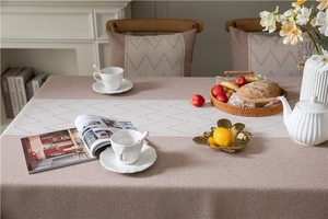 Detail of Nordic geometric wave jacquard tablecloth and matching soft chair cover set