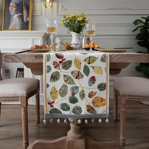 Elegant chenille table runner with colorful leaf patterns and dragonfly beaded tassels
