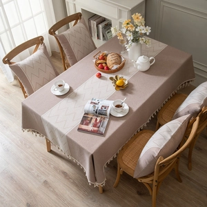 Elegant purple jacquard tablecloth with geometric wave patterns and handmade tassels