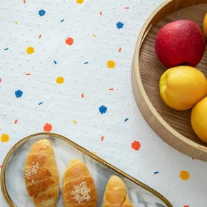 French cotton tablecloth with colorful graffiti polka dots and geometric jacquard texture