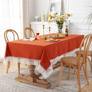 Solid brick red washed cotton rectangular tablecloth with elegant white lace borders