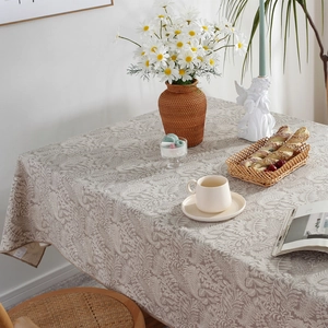 Floral waterproof polyester tablecloth with elegant leaf patterns and premium hemmed edges