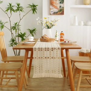 Beige hollow woven table runner with lace tassels for an American pastoral dining room decor