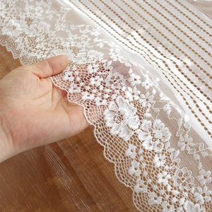 Elegant white lace table runner with floral embroidery for romantic wedding decor