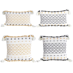Set di 4 federe per cuscini in maglia boho con motivi geometrici e nappe decorative