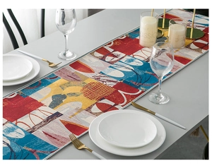 Detail of modern abstract geometric table runner with colorful jacquard pattern and texture